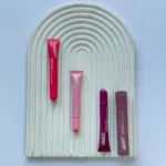 لیپ گلاس حجم‌ دهنده AOZY مدل رود 12 میل | AOZY Plumping Lip Gloss (Road Design)